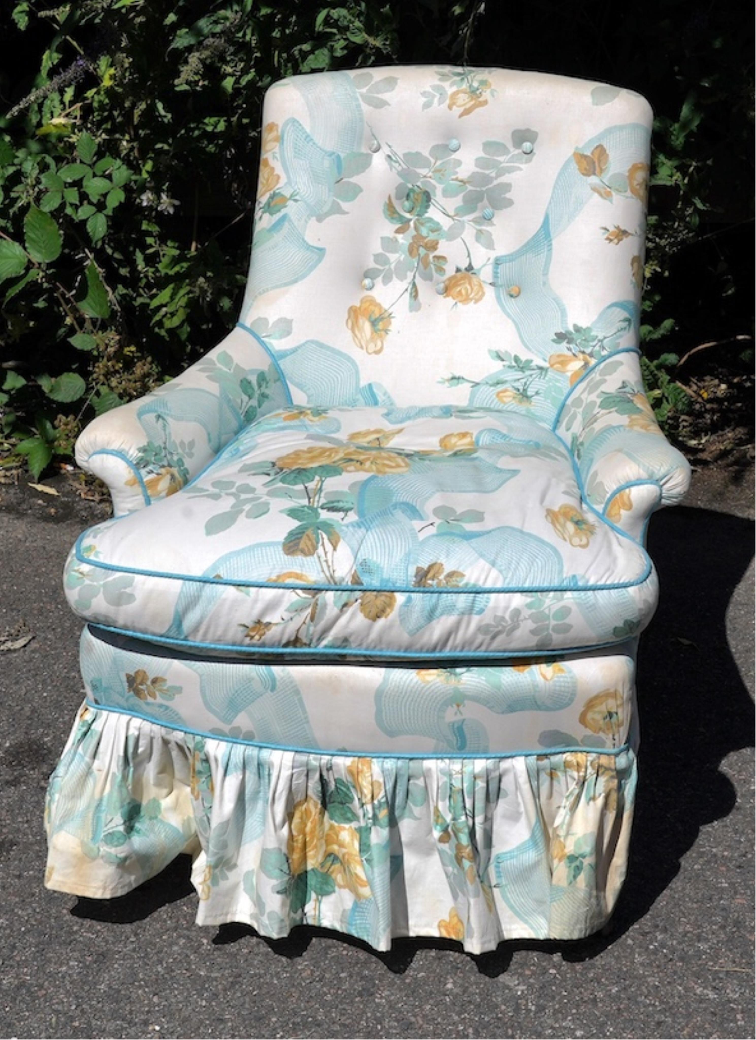 A Victorian small button back armchair with floral fabric upholstery, width 70cm, depth 60cm, height 80cm. Condition - fair